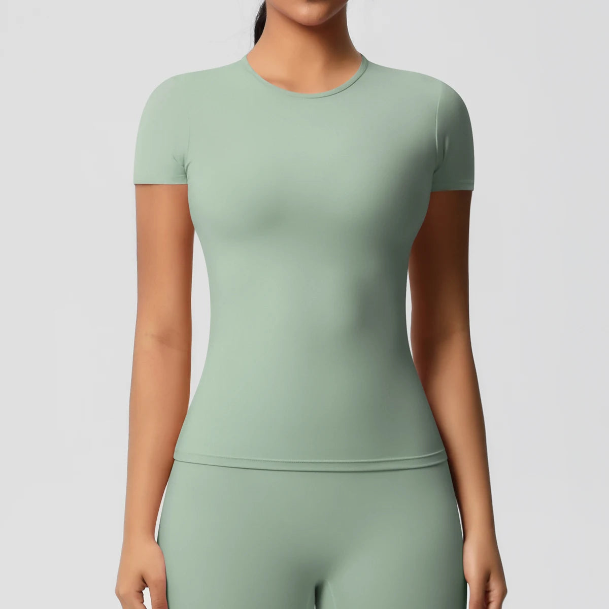 Women’s High-Elastic Sports Top – Breathable Gym & Workout Tee